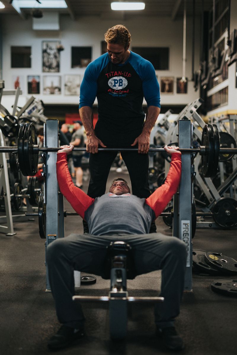 A client training with a personal trainer, a local service booked through ReStart
